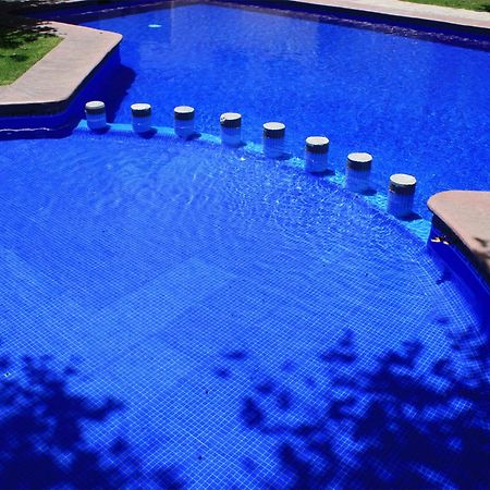 Aurea Hotel And Suites Запопан Екстериор снимка