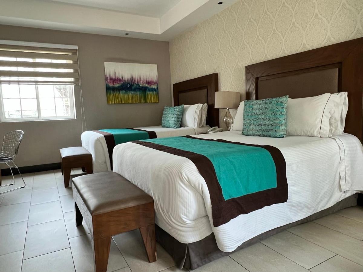 Aurea Hotel And Suites Запопан Екстериор снимка