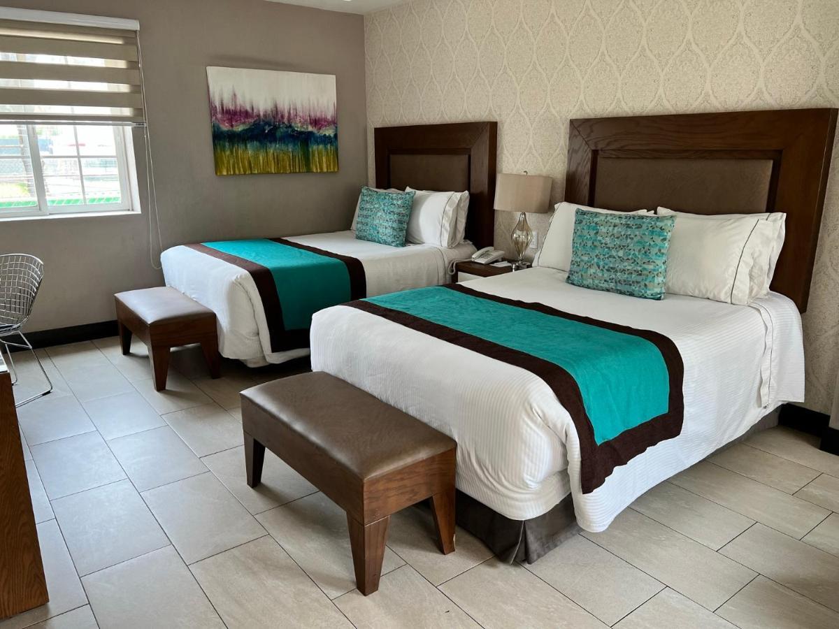 Aurea Hotel And Suites Запопан Екстериор снимка