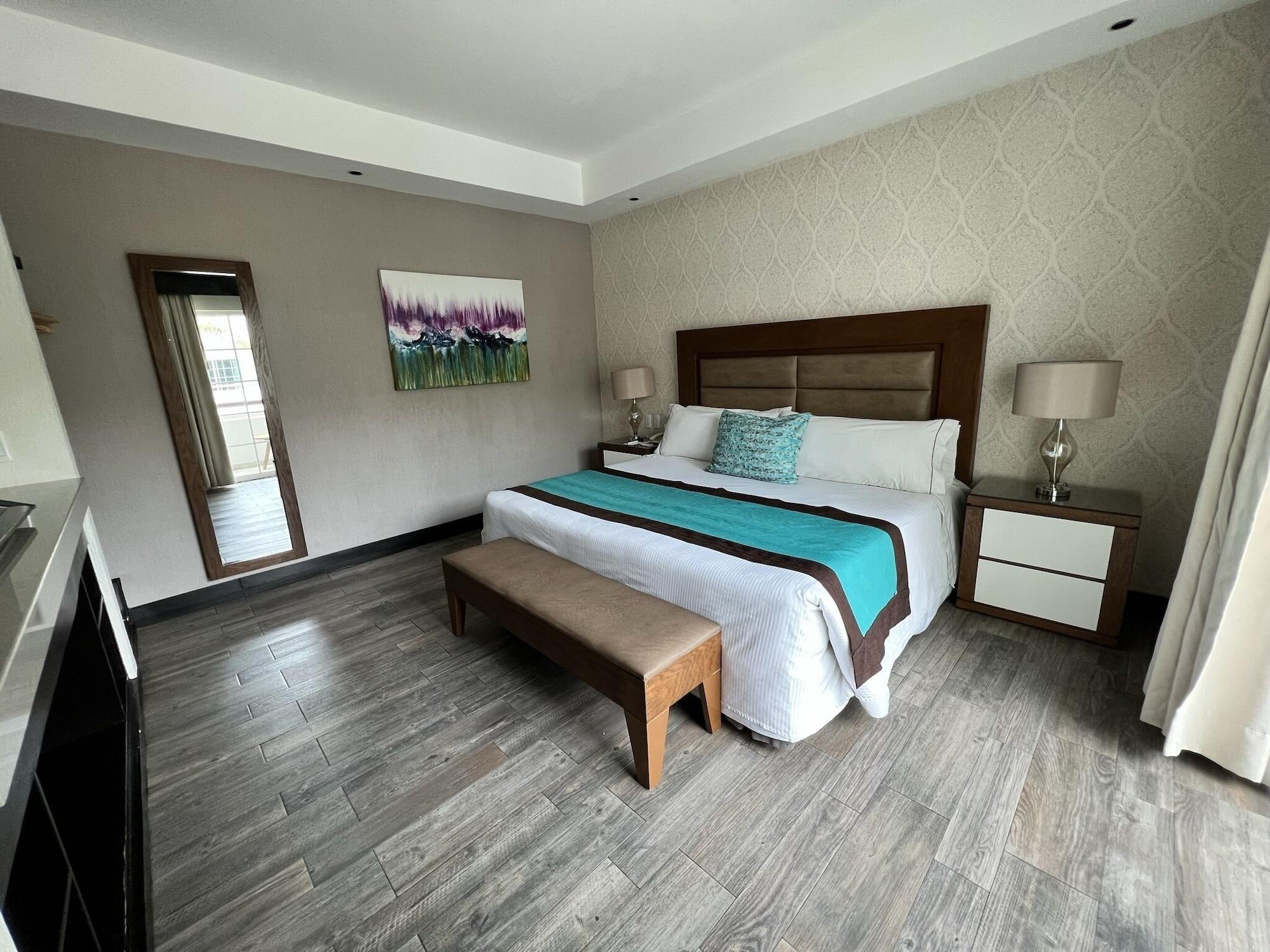 Aurea Hotel And Suites Запопан Екстериор снимка